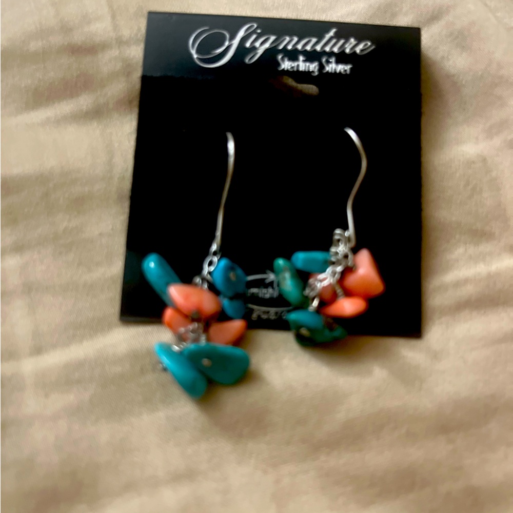 Brand new pair of stone ear rings with silver hooks